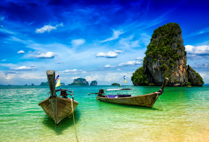 Long tail boats on tropical beach (Pranang beach), Krabi, Thailand