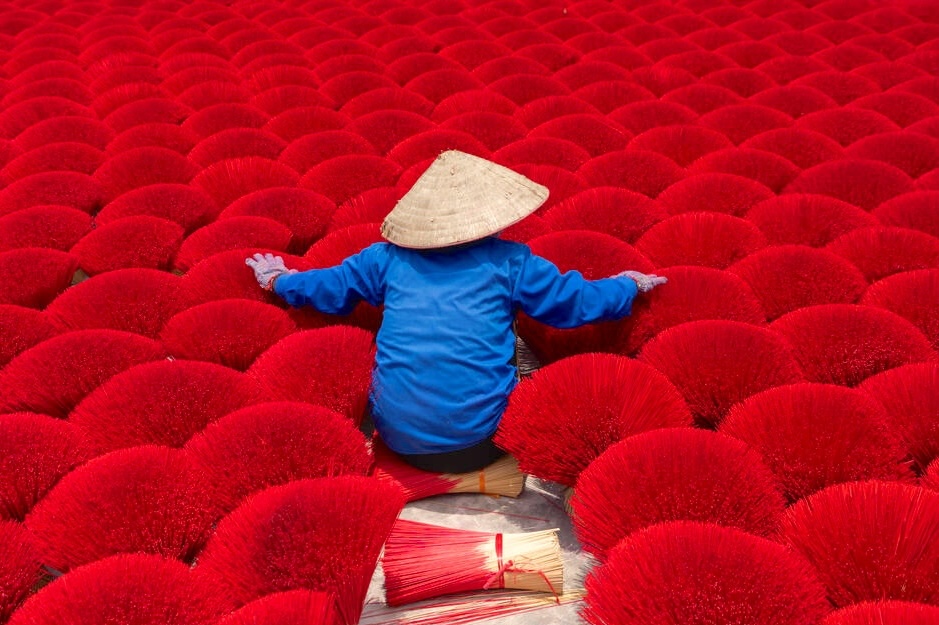 A worker working with incense pattern texture background in Asia, Vietnam. People lifestyle.